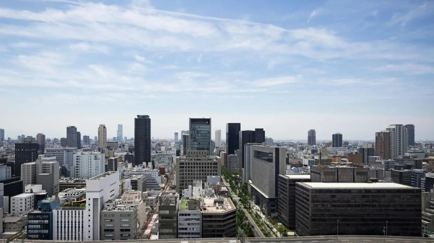 an aerial view of a city with tall buildings at The St. Regis Osaka in Osaka