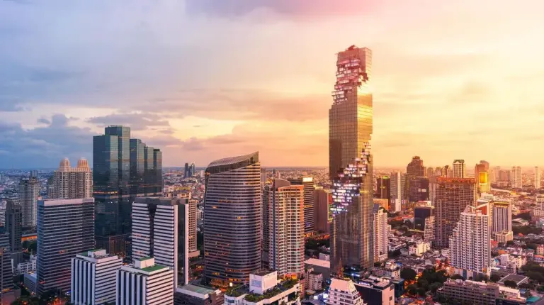 a city skyline with a tall skyscraper at The Standard