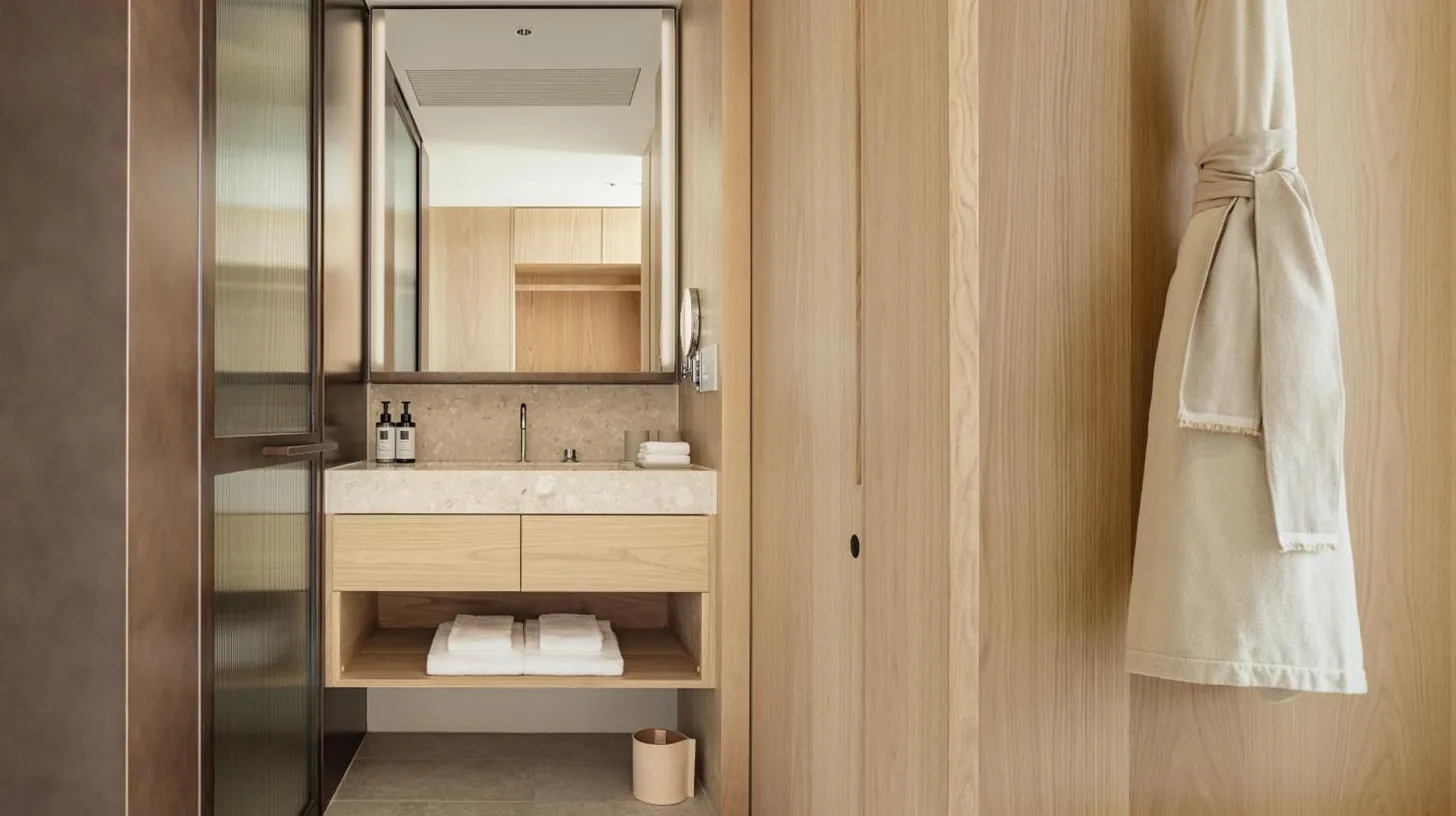 a bathroom with a sink and a mirror at TRUNK(HOTEL) YOYOGI PARK in Tokyo