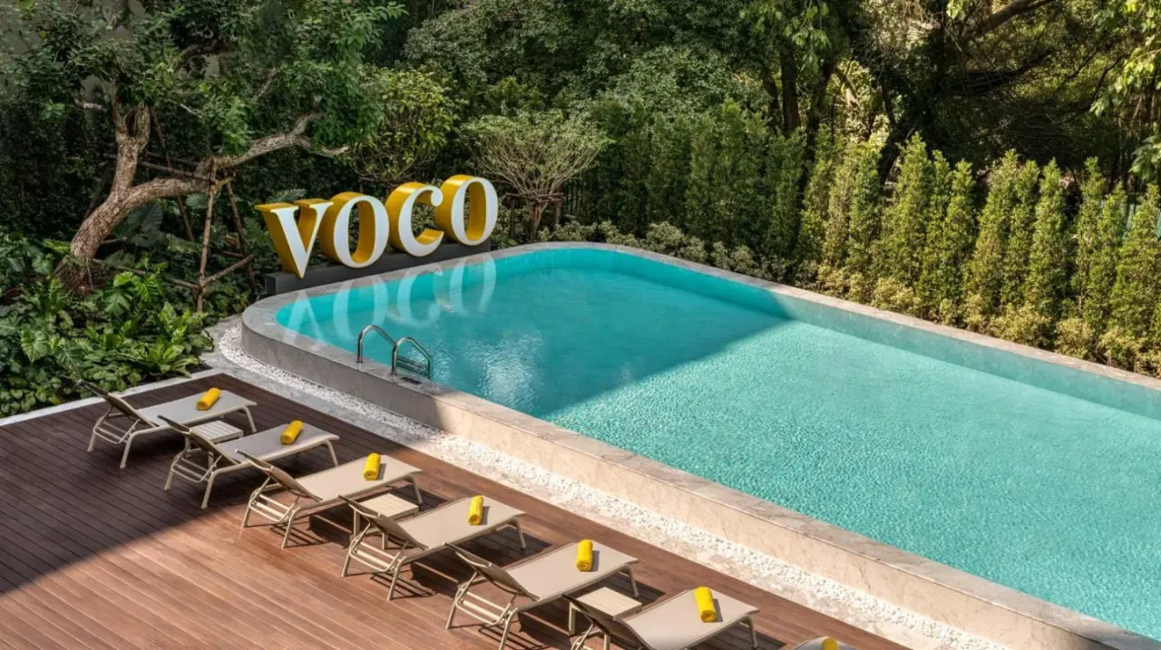 a rendering of a salon with chairs and tables at voco Bangkok Surawong by IHG in Bangkok