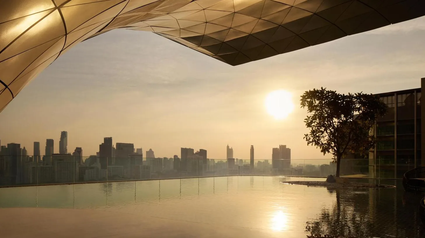 a view of the city from the rooftop of a building at Waldorf Astoria Bangkok in Bangkok