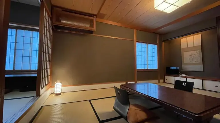 a conference room with a table and chairs in it at Yuzuya Ryokan - Adult Only in Kyoto